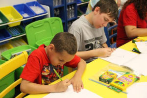 Free art supplies help the kids get completely lost in their own world of creativity.